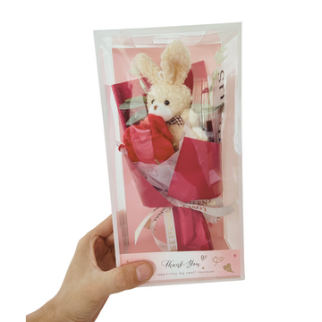 Ramo de conejito de peluche con rosa en caja